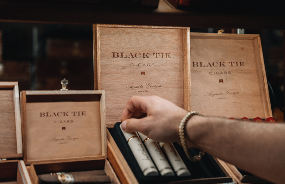 Case study image of the Black Tie Cigars branding in the portfolio of graphic designer Abbi Roush.